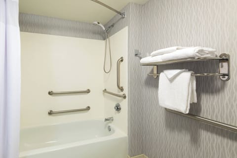 Suite, 2 Queen Beds | Bathroom | Combined shower/tub, free toiletries, hair dryer, towels