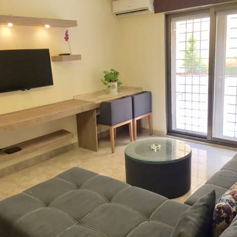 Deluxe Apartment, 1 Bedroom, Terrace | Living area