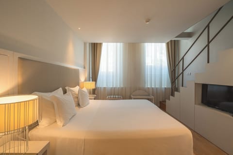 Family Suite, 2 Bedrooms | Minibar, in-room safe, individually decorated, individually furnished