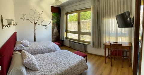 Double or Twin Room | Desk, blackout drapes, cribs/infant beds, free WiFi