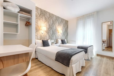 Twin Room | Premium bedding, desk, blackout drapes, iron/ironing board