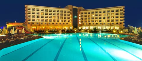 Indoor pool, seasonal outdoor pool, pool umbrellas, sun loungers