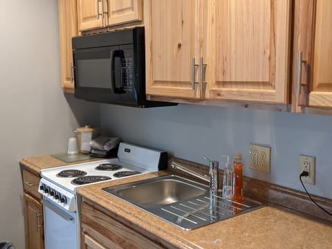 Family Room | Private kitchen | Fridge, microwave, coffee/tea maker