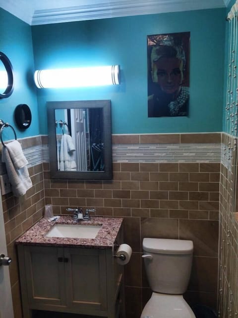 Suite, 1 Bedroom | Bathroom | Combined shower/tub, hair dryer, towels