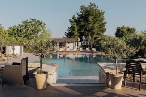 Indoor pool, seasonal outdoor pool, pool umbrellas, sun loungers