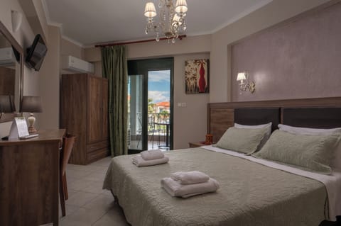 Studio, Garden View | In-room safe, desk, iron/ironing board, free cribs/infant beds