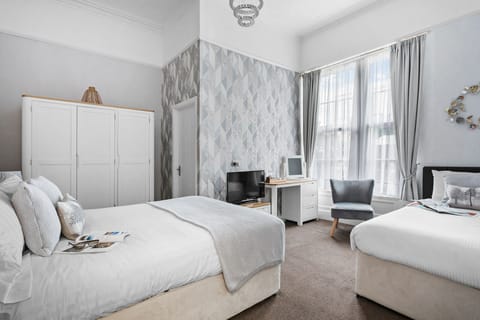 Family Room (2 Adults + 1 Child) | Premium bedding, minibar, blackout drapes, iron/ironing board