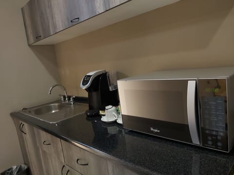 Design Suite, 1 Bedroom, Bathtub, Ground Floor | Private kitchen | Espresso maker, coffee/tea maker