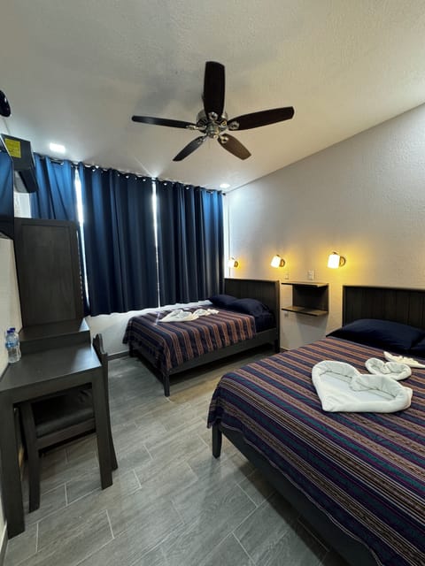 Deluxe Double Room, 2 Double Beds, Refrigerator | Individually furnished, laptop workspace, blackout drapes, soundproofing