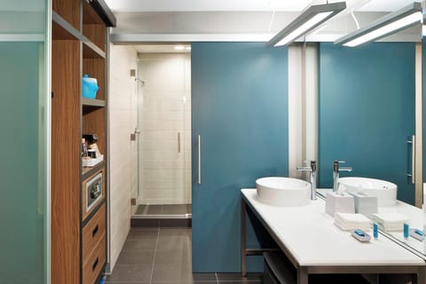 Rainfall showerhead, designer toiletries, hair dryer, towels