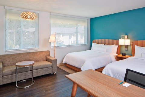 Premium bedding, down comforters, pillowtop beds, in-room safe