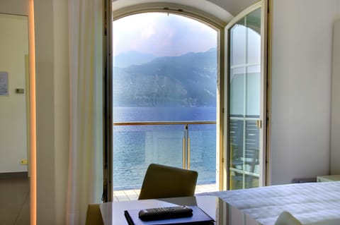 Double or Twin Room, Balcony, Lake View | Minibar, in-room safe, desk, free WiFi