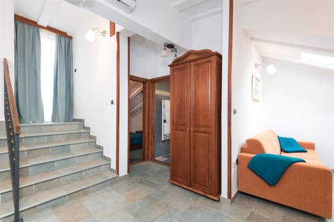 Apartment, 1 Bedroom, Balcony | Living area | Flat-screen TV