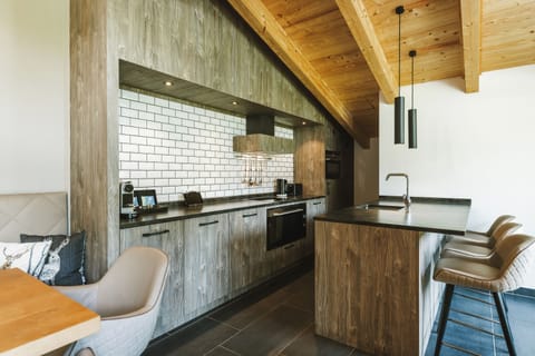 3-bedroom penthouse with private sauna | Private kitchen | Espresso maker, coffee/tea maker, electric kettle, highchair