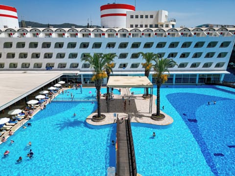 Indoor pool, outdoor pool, pool umbrellas, sun loungers
