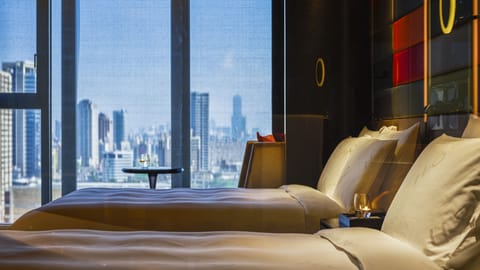 Premium bedding, down comforters, minibar (free items), in-room safe