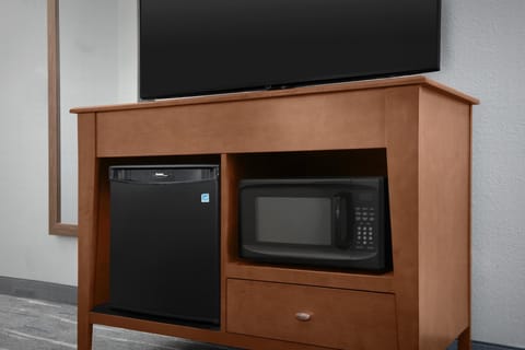 Desk, blackout drapes, iron/ironing board, free cribs/infant beds