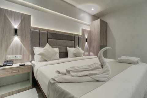 Standard Room | Individually decorated, individually furnished, desk, blackout drapes