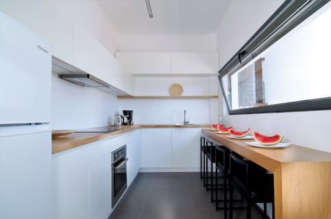 Apartment, Sea View | Private kitchen | Full-size fridge, microwave, oven, stovetop