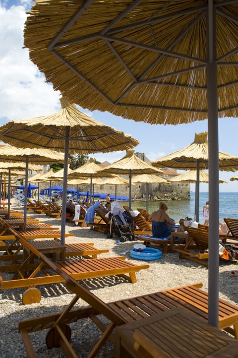 Private beach, sun loungers, beach umbrellas, beach towels