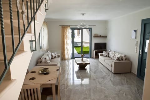 Family Duplex | Living area | Flat-screen TV