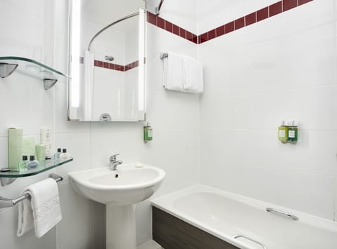 Combined shower/tub, hair dryer, towels, toilet paper