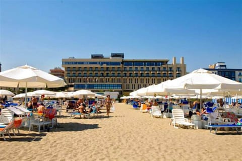 Private beach, sun loungers, beach umbrellas, beach bar