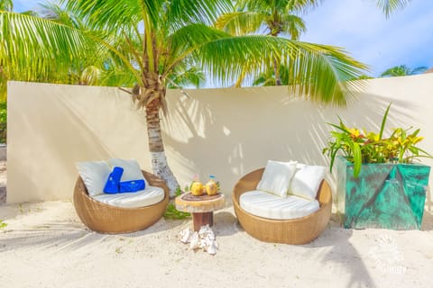 Beach nearby, white sand, beach towels