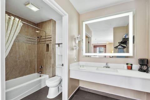 Standard Double Room, 2 Double Beds | Bathroom | Combined shower/tub, free toiletries, hair dryer, towels