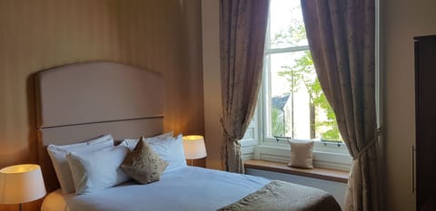 Standard Double Room | Minibar, desk, laptop workspace, iron/ironing board