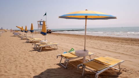 Sun loungers, beach umbrellas