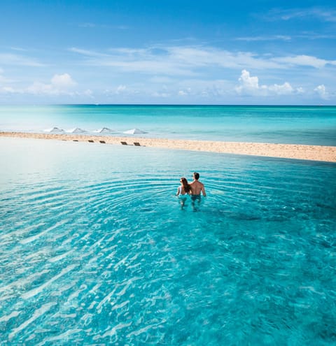 4 outdoor pools, cabanas (surcharge), pool umbrellas