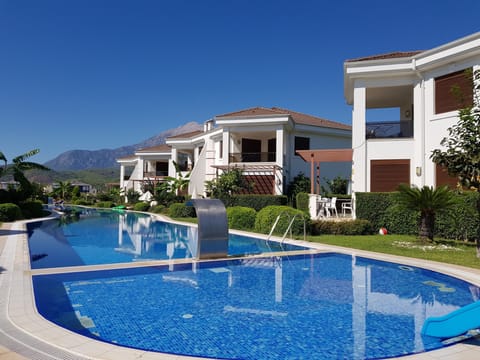 Outdoor pool, pool umbrellas, sun loungers