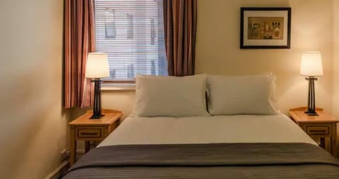 Desk, laptop workspace, free WiFi, bed sheets