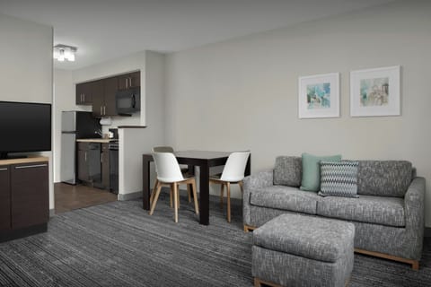 Suite, 1 Bedroom | Living area | 32-inch TV with cable channels, Netflix, iPod dock