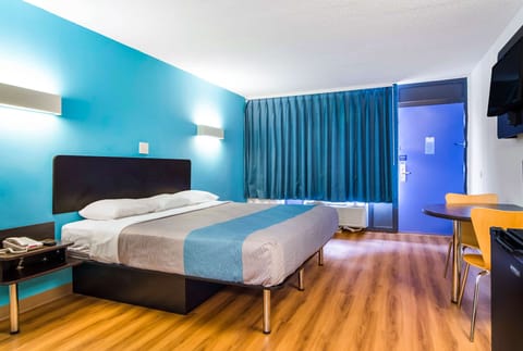 Premium bedding, desk, blackout drapes, iron/ironing board