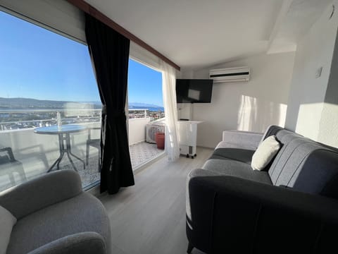Deluxe Penthouse, Non Smoking, Sea View | Minibar, in-room safe, soundproofing, iron/ironing board