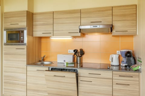 Premium cottage, 3 bedrooms | Private kitchen | Fridge, microwave, stovetop, dishwasher