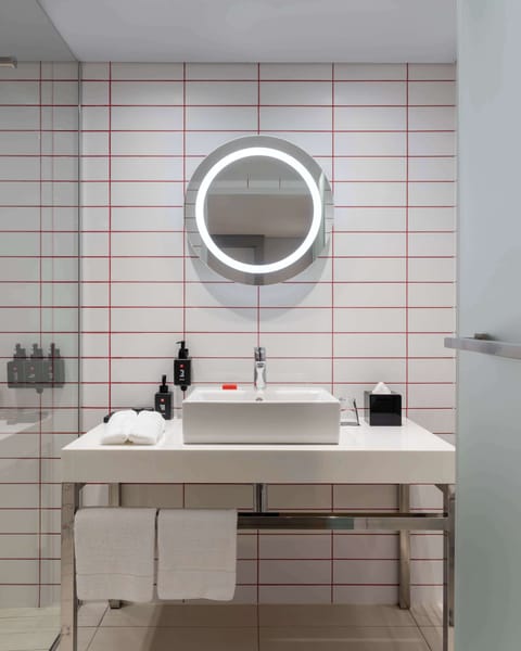 Family Room (Table Mountain View) | Bathroom | Shower, eco-friendly toiletries, towels