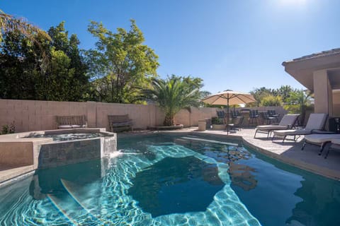 Pool and Spa with lounge chairs