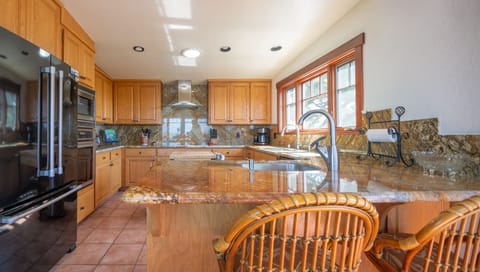 Remodeled kitchen located on the upper main level