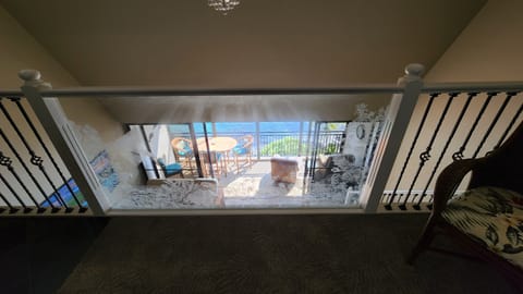 Looking down from 2nd Bedroom Upstairs Loft to Ocean Lanai