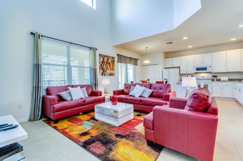 Spacious Family Room with Atrium and Fan above