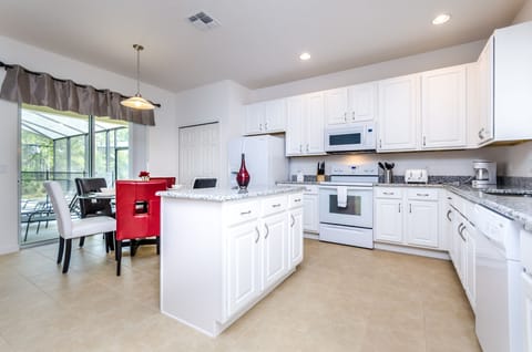 Open Plan Kitchen With Island and Breakfast Nook
