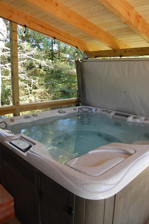 covered Jacuzzi and sitting area