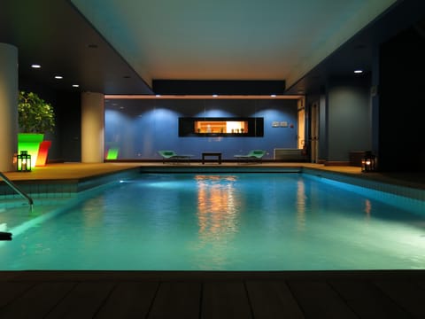 Indoor pool, open 7:00 AM to 10:00 PM, sun loungers