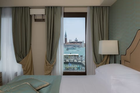 Double Room, Lagoon View (Charming) | In-room safe, desk, free WiFi, bed sheets