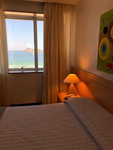 Deluxe Room, 1 Double Bed, Sea View | In-room safe, blackout drapes, free WiFi, bed sheets