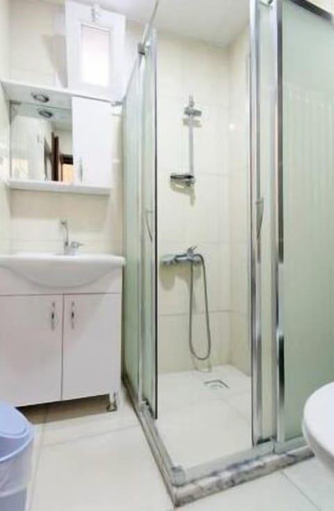 Shower, free toiletries, hair dryer, slippers