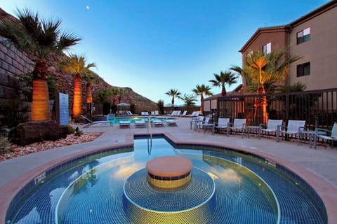 Seasonal outdoor pool, open 8:00 AM to 11 PM, pool umbrellas
